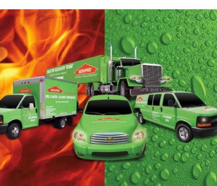 Fire and water backround with SERVPRO vehicles.