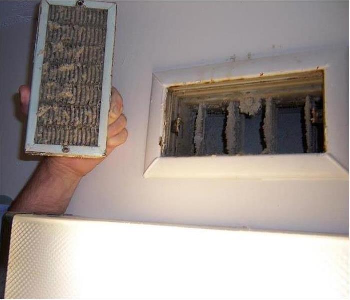 Dirty HVAC vent and grill.